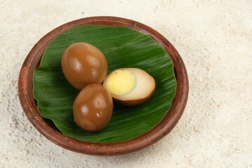 telur pindang or boiled egg cooked in brown spice and soy sauce