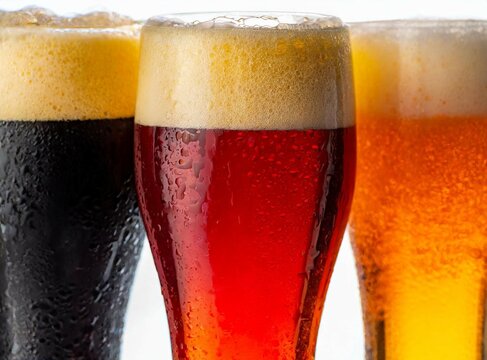Isolated glasses of craft beer closeup photography