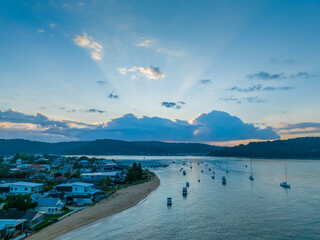 Fototapeta na wymiar Aerial sunrise over Brisbane Water between Ettalong Beach and Wagstaffe