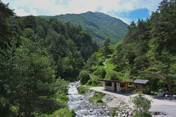 Gazebo for relaxation on the hiking trail to the Lyazhgi Waterfall