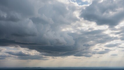 Obraz premium A Captivating Sky Photo Immersed in Cloudy or Overcast Colors. Witness the Subtle Beauty of Gray and White Tones as Clouds Paint the Sky, Creating a Diffuse, Muted Light.