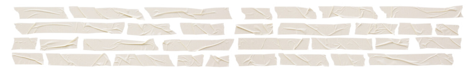 Obraz premium set of various pieces of masking tape isolated with clipping path on a white background.