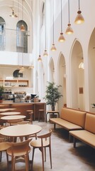 Fototapeta na wymiar Elegant European-style cafe with vaulted ceilings and large windows