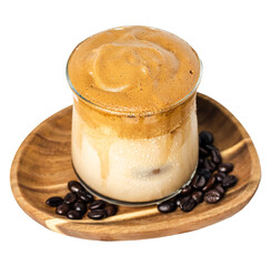 a cup of coffee sitting on top of a wooden plate