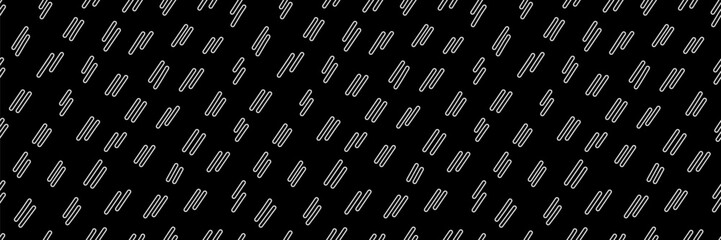 Hand drawn small dash seamless pattern. Doodle stroke on black background. Abstract vector wallpaper, print.