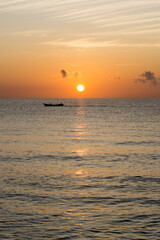 Fishing boat at sunrise 