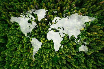 A clou in the shape of the world's continents in the middle of untouched nature. A metaphor for ecological travel, conservation, climate change, global warming and the fragility of nature.