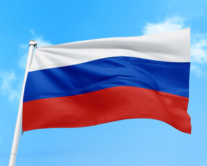 Russia flag fluttering in the wind on sky.