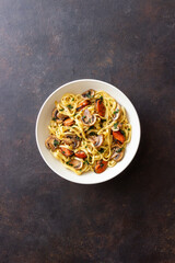 Tagliatelle pasta with mussels and mushrooms. Italian cuisine. Seafood.