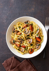 Tagliatelle pasta with mussels and mushrooms. Italian cuisine. Seafood.