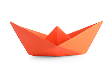 Red origami boat on white background