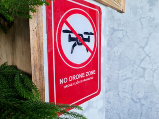 sign prohibiting flying drones in a private area.