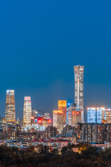 High View Night Scenery of Beijing CBD Architecture Complex and Ferris Wheel in China