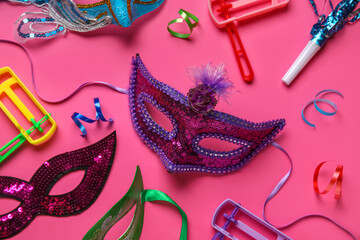 Carnival masks with decor on pink background