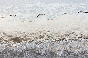 Fototapeta na wymiar Macro photography of window glass texture on a cold winter day