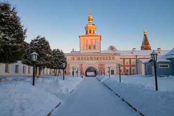 January twilight in the Iversky Valdai Monastery. View of the Church of St. Michael the Archangel...