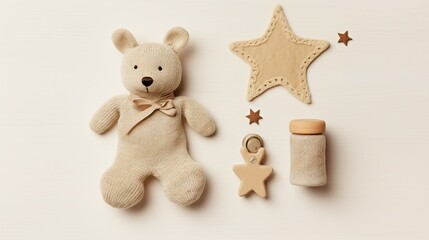 Charming Baby Boy Concept: Knitted Bunny, Blue Teether, and Playful Toys on Pastel Background - Precious Infant Essentials