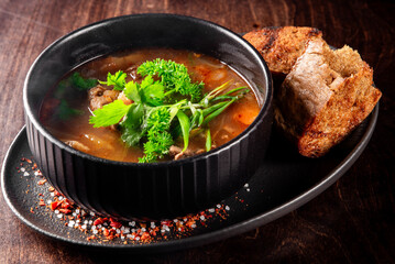 Shurpa soup with lamb meat in bowl