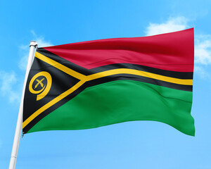 Vanuatu flag fluttering in the wind on sky.