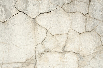 Old damaged cement block with cracks. For the apocalyptic design of old ruined architecture. Tile...