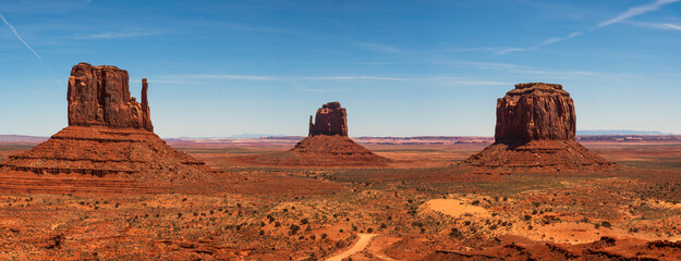 Monument valley landscape, Utah, USA. The west and east Mitten, Merrick Butte . clear blue sky,...