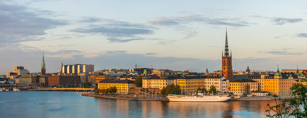 A detailed panoramic shot of the old town of Stockholm in evening sunlight lights in autumn, riddarholmen, old town,kungsholmen and the downtown 