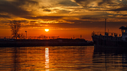 Leaving pier to Upper Bay at sunset in Red Hook, Brookyn, New York