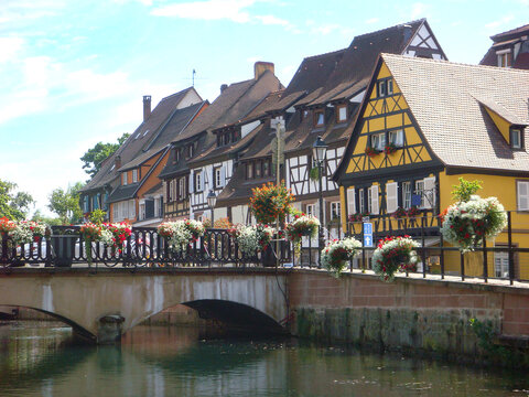 Beautiful view of the river and houses on a summer day. Kolmar. France.