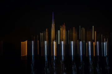 Abstract Long exposure lighting of Manhattan, from Hudson bay, NYC, USA