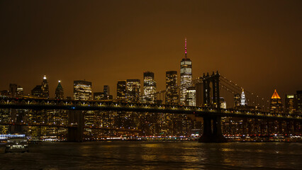 Fototapeta na wymiar View of Manhattan with Brooklyn bride by night, New York City, USA