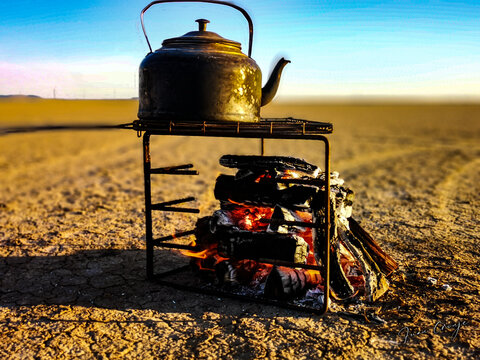 Campfire with kettle on Verneukpan, South Africa
