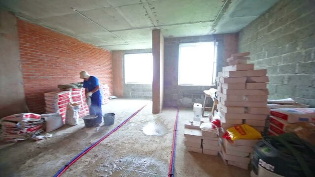 Room with universal gypsum plaster and others building materials.