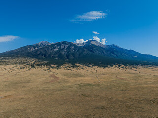 Expansive Colorado Plains with a Mountainous Backdrop