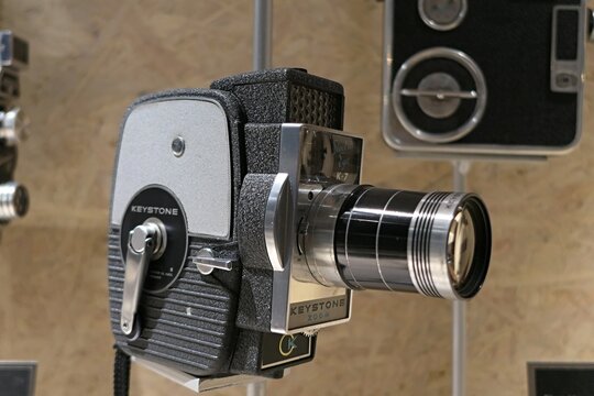 Side view of vintage film camera Keystone Electric Eye K7 Zoom, manufactured in Boston, USA in years 1960-1975. Displayed on historical exhibition in Brno, Czech Republic. 