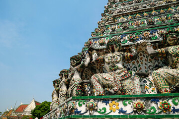 The Temple of Dawn Wat Arun with beautiful and blue sky in Bangkok, Thailand
