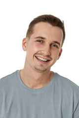 Obraz premium portrait of young smiling man on white background