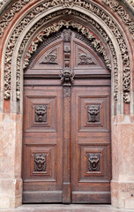 Wooden door of an old house in Prague