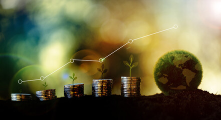 Plants grow on stacked coins, Renewable energy generation is essential for the future. Renewable energy, based green business can limit climate change and global warming. Green finance esg concept. - obrazy, fototapety, plakaty