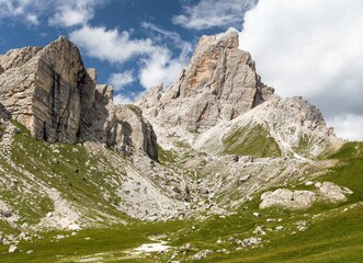 Alps dolomites mountains meadow and beautiful rocky peak
