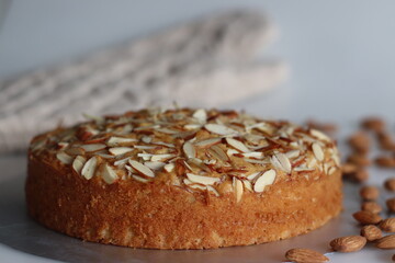 Almond buttermilk cake. A delicious cake adorned with a generous sprinkle of chopped almonds, perfect for tea time