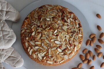 Almond buttermilk cake. A delicious cake adorned with a generous sprinkle of chopped almonds, perfect for tea time