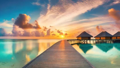 Foto op Aluminium amazing beach landscape beautiful maldives sunset seascape view horizon colorful sea sky clouds over water villa pier pathway tranquil island lagoon tourism travel background exotic vacation © Richard