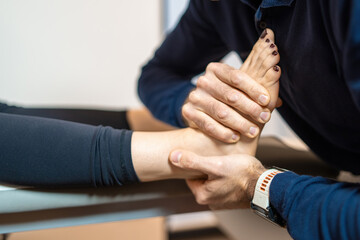 Physical Therapist Administering Foot and Ankle Treatment