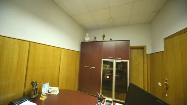 Office room of executive, stylish furniture, wooden trim