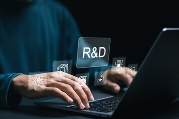 Person use laptop with R and D word for Research and Development. Manage costs more efficiently,...