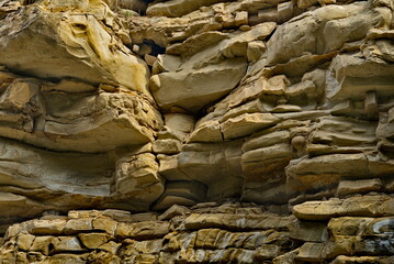 Russia, the North Caucasus. Fragments of steep cliffs with an unusual texture in the Chegem gorge.