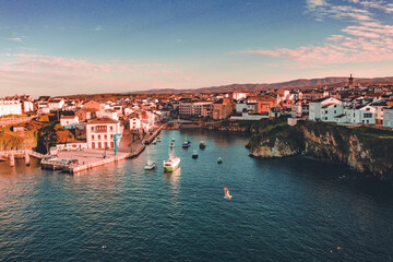 Obraz premium Aeral view of Tapia de Casariego, a small coastal town in Asturias, Spain. Beautiful fishing port with boats