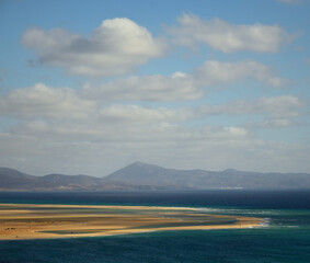 Awesome Sotavento beach, clouds and blue sky, southeast of Fuerteventura Island, Canary Islands