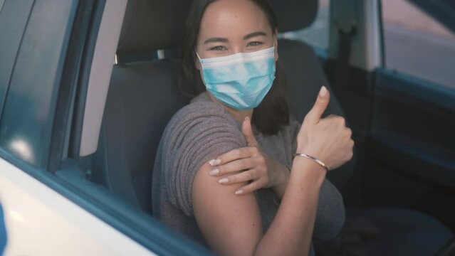 Doctor, car and woman with thumbs up for vaccine injection, virus treatment success or covid disease protection. Medicine, health support and nurse immunization of patient with good service feedback