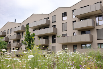 Residential modern four-story house stylized as townhouses